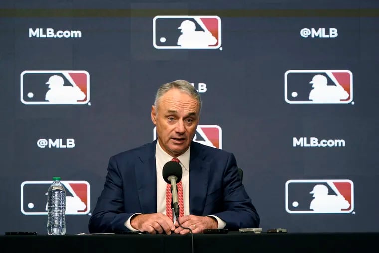 Major League Baseball commissioner Rob Manfred speaks during a news conference after owners locked out players in December.