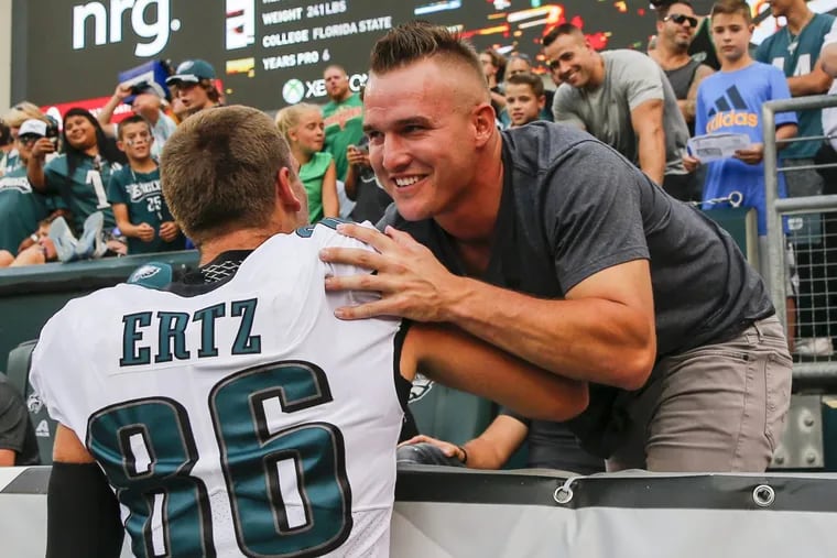 Los Angeles Angels’ superstar Mike Trout greets Eagles tight end Zach Ertz before a recent exhibition game in Lincoln Financial Field.