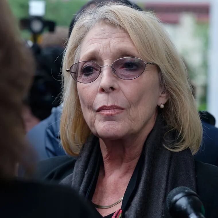 Victoria Valentino, a former Playboy model who alleges that Bill Cosby raped her, speaks to the media during Cosby's sexual assault trial at the Montgomery County Courthouse in 2017.