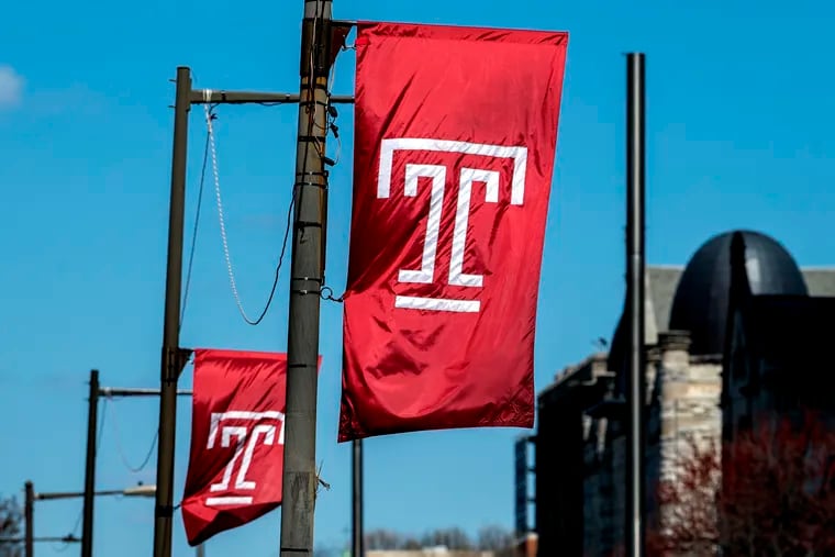 Temple “T” logo flags on North Broad Street on the campus of Temple University
