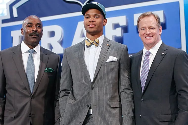 Vanderbilt wide receiver Jordan Matthews, center, poses for photos with NFL commissioner Roger Goodell and former Philadelphia Eagles wide receiver Mike Quick after being selected as the 42 pick by the Eagles in the second round of the 2014 NFL Draft, Friday, May 9, 2014, in New York. (Jason DeCrow/AP)