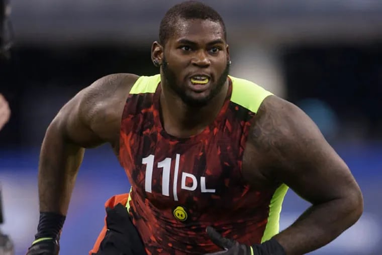 Florida defensive lineman Sharrif Floyd runs a drill during the NFL football scouting combine in Indianapolis, Monday, Feb. 25, 2013. (Dave Martin/AP)