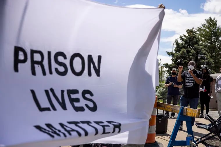 Protesters call for improved conditions for incarcerated people during an April demonstration at the Curran-Fromhold Correctional Facilty.