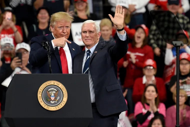 President Trump acknowledges Vice President Mike Pence at the beginning of his campaign rally at the Giant Center in Hershey, Dec. 10, 2019.