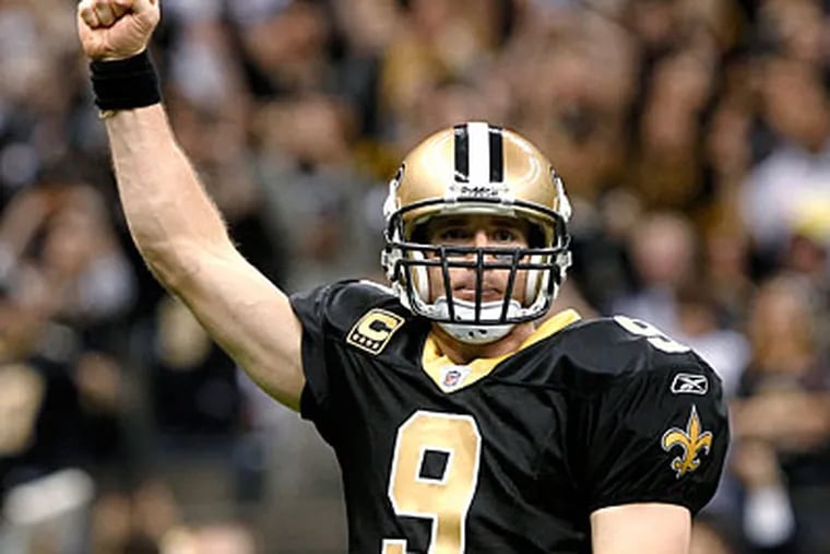 Quarterback Drew Brees set a record for most passing yards in a season last year. (Rusty Costanza/AP)