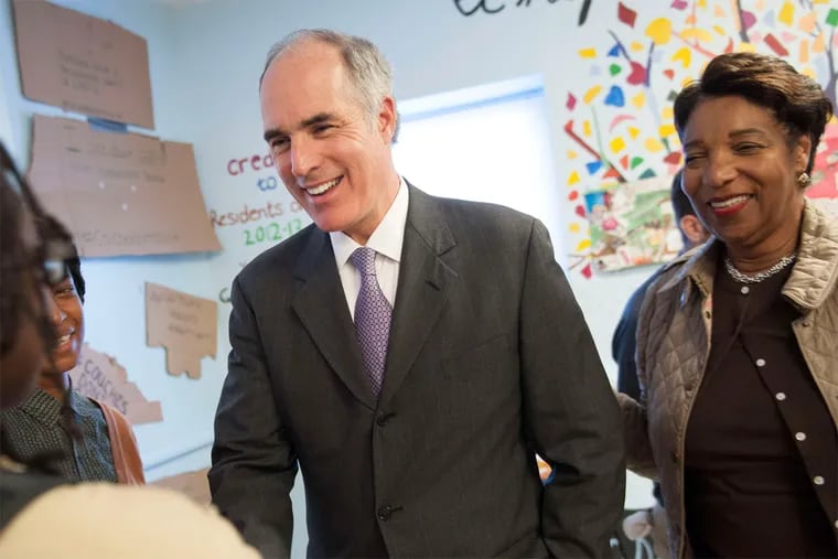 U.S. Sen. Robert P. Casey with Lynnette Jones of the People's Emergency Center after a news conference that called for federal money to fight youth homelessness.