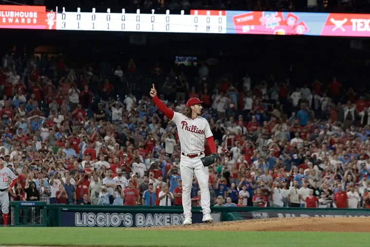 Michael Lorenzen points to the fly ball in the top of the ninth inning that, once caught, gave him a no-hitter against the Washington Nationals.