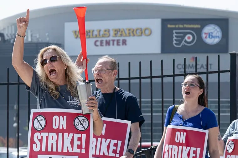 Aramark workers rally in the Wells Fargo Center parking lot on Tuesday, Apr 9, 2024. Concession workers at the arena are on strike.