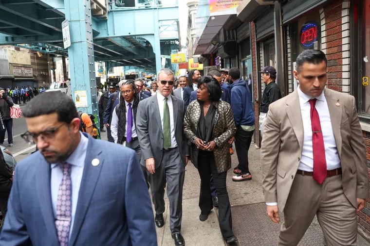 Mayor Cherelle L. Parker walks along Kensington Avenue with Managing Director Adam Thiel on Thursday, April 11, 2024. Thiel announced plans for an expanded shelter facility this week.