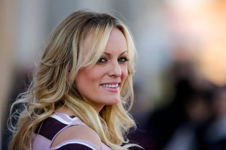 FILE - In this Oct. 11, 2018, file photo, adult film actress Stormy Daniels attends the opening of the adult entertainment fair Venus in Berlin, Germany. The chairman of the House Oversight Committee says ethics officials believe President Donald Trump’s lawyers provided false information about buying Daniels' silence.