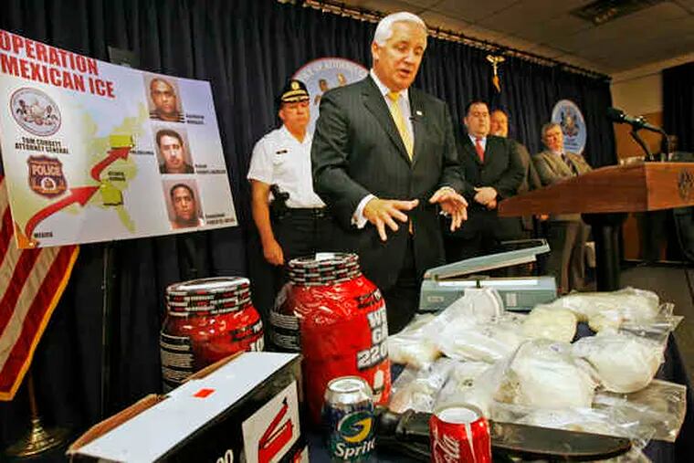 Pennsylvania Attorney General Tom Corbett displays methamphetamine at a Philadelphianews conference where he announced the charges in Operation Mexican Ice.