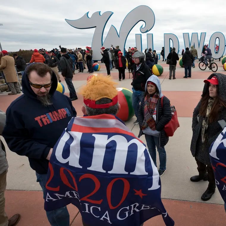 Supporters of then-President Donald Trump stand in a crowd near the iconic Wildwoods sign near the Wildwoods Convention Center as they wait to enter a campaign rally with Trump in Wildwood in January 2020.