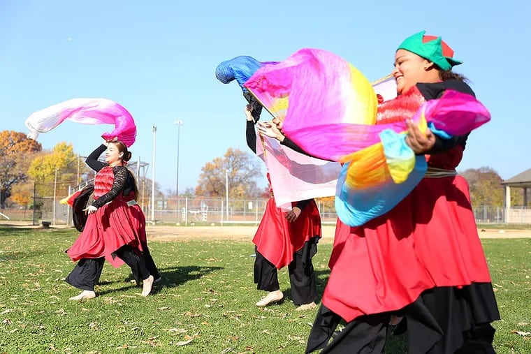 The Dreamchasers dance group from Iglesias Manto de Gloria church, perform during the Seasonal Unity Day festival at Hunting Park Recreation Center on November 19, 2016.  ( TONI FARINA / Staff Photographer )