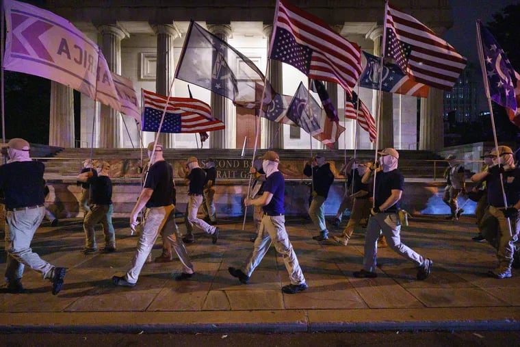 Members of the Patriot Front, a white supremacist group, march in Philadelphia on July 3, 2021.
