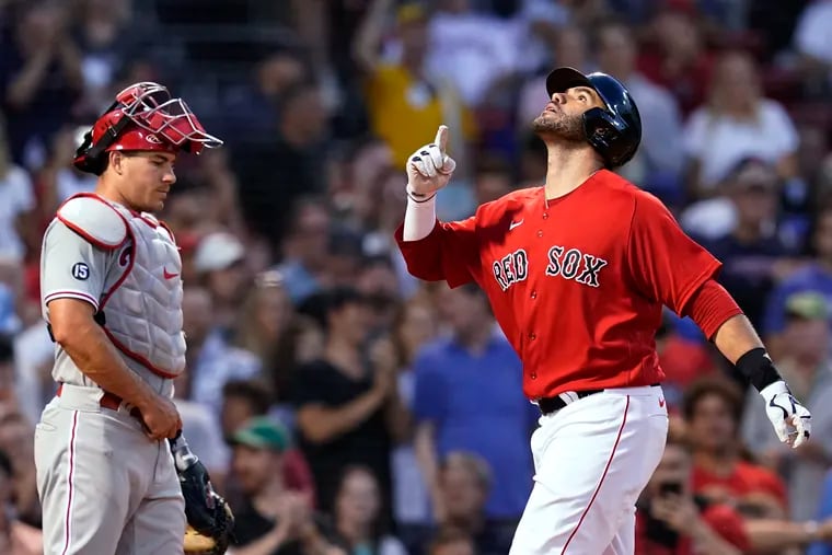 Boston's J.D. Martinez celebrates his three-run home run in the second inning of a brutal Friday night for the Phillies. 


run near Philadelphia Phillies catcher J.T. Realmuto during the second inning of a baseball game at Fenway Park, Friday, July 9, 2021, in Boston. (AP Photo/Elise Amendola)