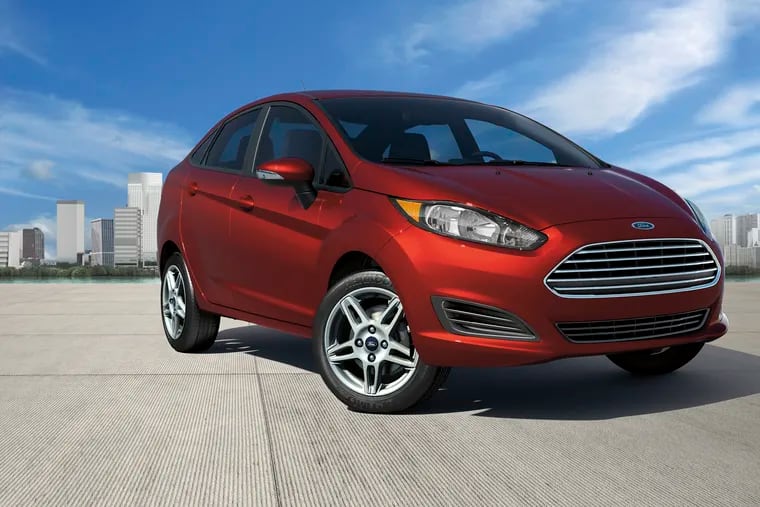 This undated photo provided by Ford shows the 2019 Ford Fiesta. The vehicle returns 31 mpg combined, and there's a hatchback version for enhanced utility. (Ford via AP)
