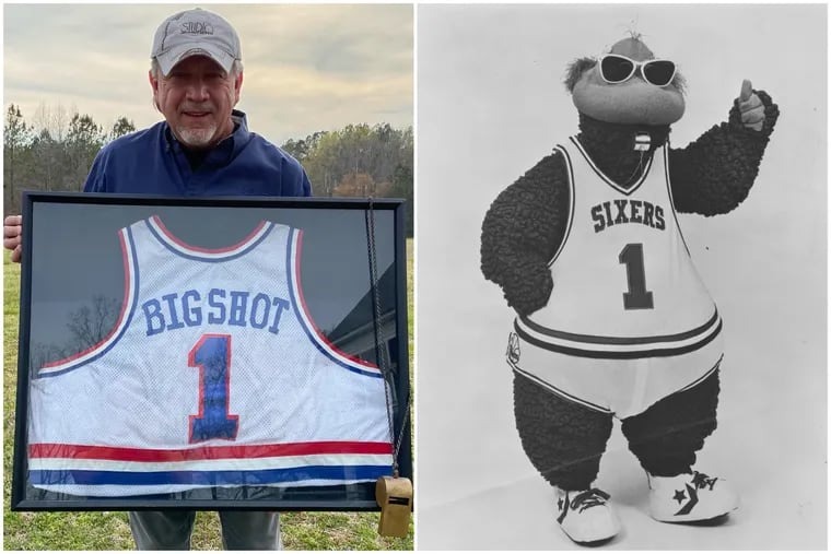 Joe Kempo, left, with the jersey of Big Shot, the Sixers mascot he performed at in the 1980s and 1990s. Former Sixers mascot Big Shot, right.