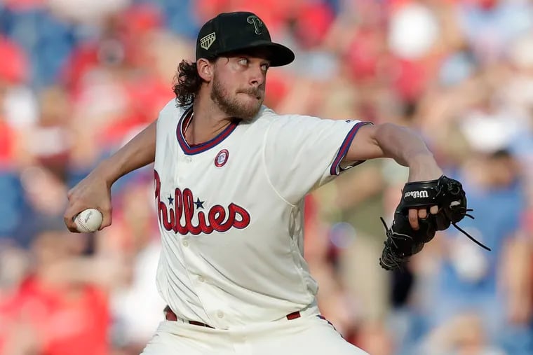 Phillies pitcher Aaron Nola throws the baseball in sixth-inning against the Colorado Rockies on Saturday, May 18, 2019 in Philadelphia.
