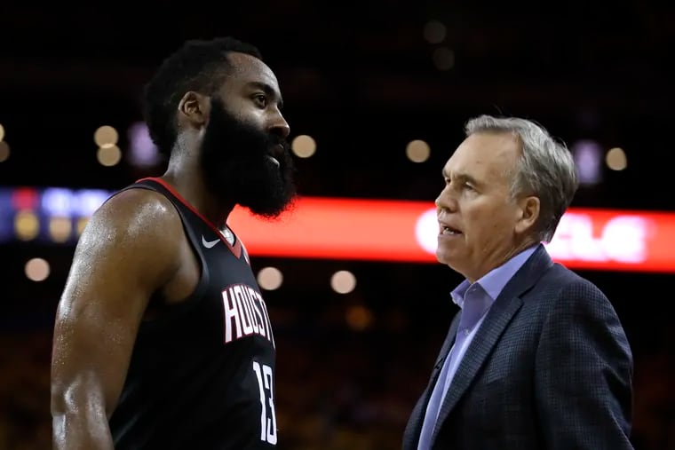 Houston Rockets' James Harden, left, speaks with coach Mike D'Antoni during the second half of Game 5 of a second-round NBA basketball playoff series against the Golden State Warriors Wednesday, May 8, 2019, in Oakland, Calif. (AP Photo/Ben Margot)