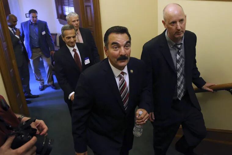 Assembly Speaker Vincent Prieto, center, announced Thursday he would not seek another term to the leadership position. (AP Photo/Mel Evans)