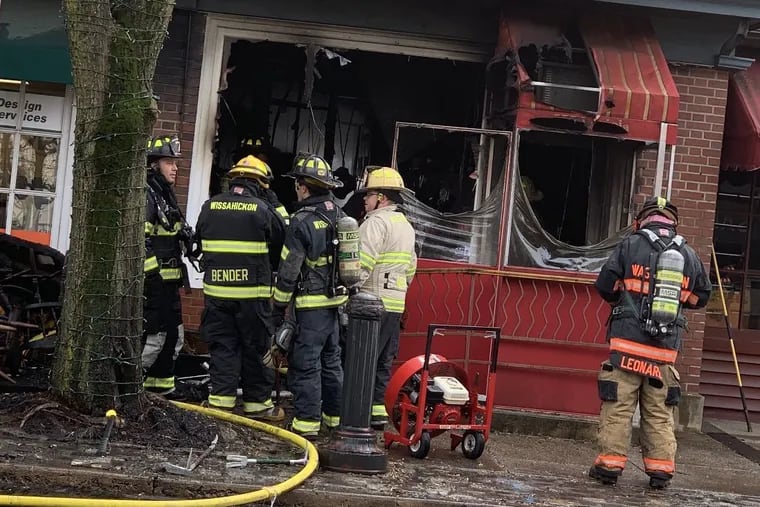 Firefighters work on the aftermath of a fire on Feb. 27, 2019, at 555 Lagiola restaurant in Ambler.