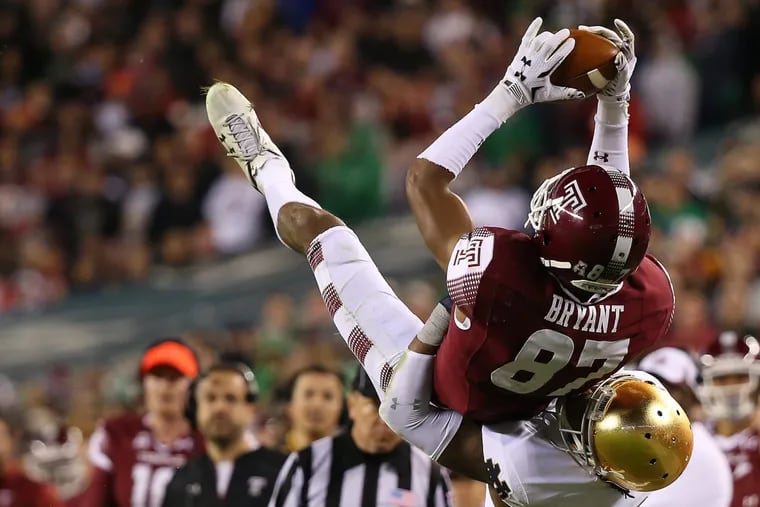 Temple's Ventell Bryant hangs onto a pass against Notre Dame's Cole Luke in the fourth quarter on Oct. 31, 2015.