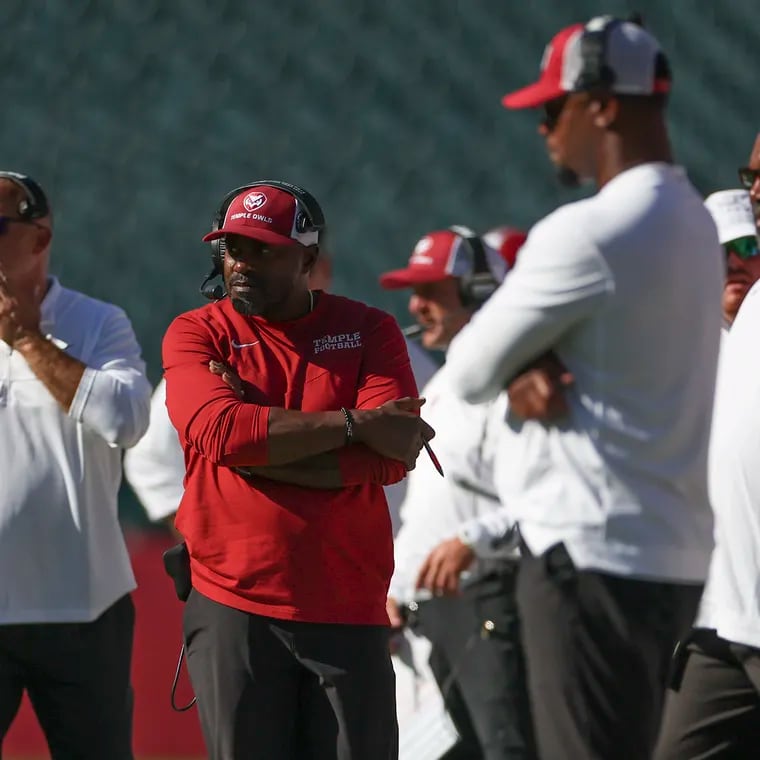 Temple Owls head coach Stan Drayton (center) and his coaching staff will hope to have a clearer picture of key roster spots following Saturday's annual Cherry and White spring football game at Edberg-Olson Field.