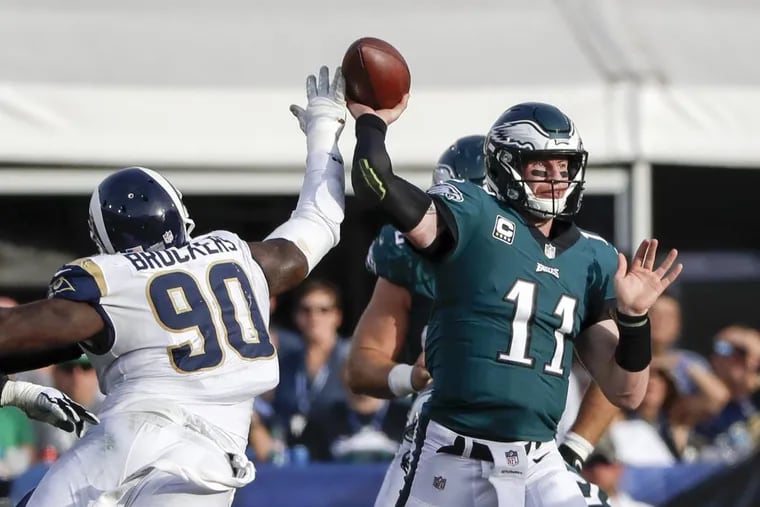 Philadelphia Eagles quarterback Carson Wentz left Sunday’s game at the Los Angeles Rams with an injury.