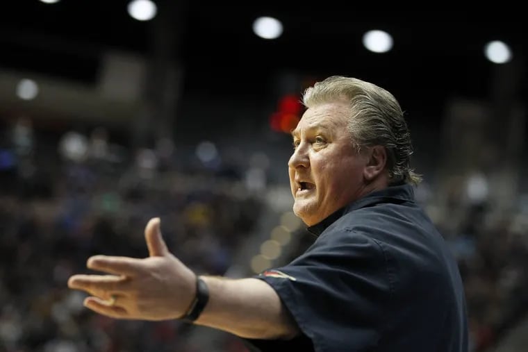 West Virginia coach Bob Huggins calls out to his players during the NCAA game against Murray State.