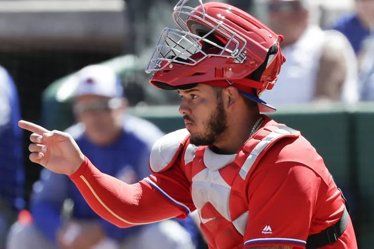 Phillies catcher Jorge Alfaro signals to the defense during a spring training game against the Toronto Blue Jays at Spectrum Field in Clearwater, FL on Sunday.