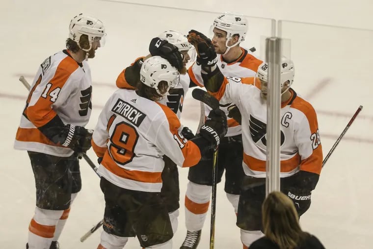 Flyers’ rookie Nolan Patrick celebrates his goal with teammates against the Penguins during the third period of Game 2 of the series on April 13.