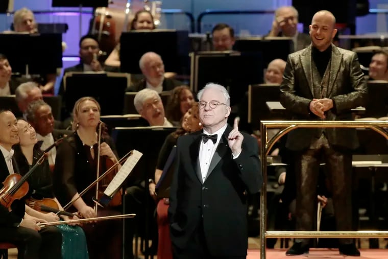 Steve Martin, the Philadelphia Orchestra, and music director Yannick Nézet-Séguin perform during the 161st Academy of Music Anniversary Concert and Ball in January 2018.