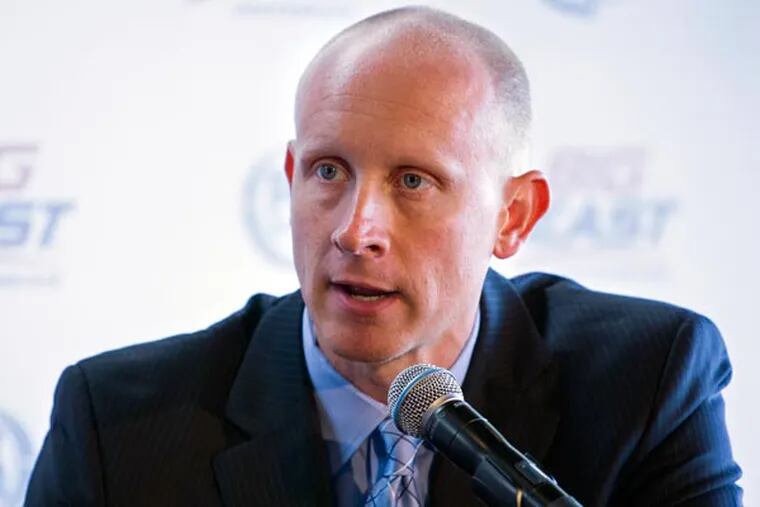Xavier head coach Chris Mack answers a questions during an interview at the Big East Conference NCAA college basketball media day in New York, Wednesday, Oct. 16, 2013. (Craig Ruttle/AP)