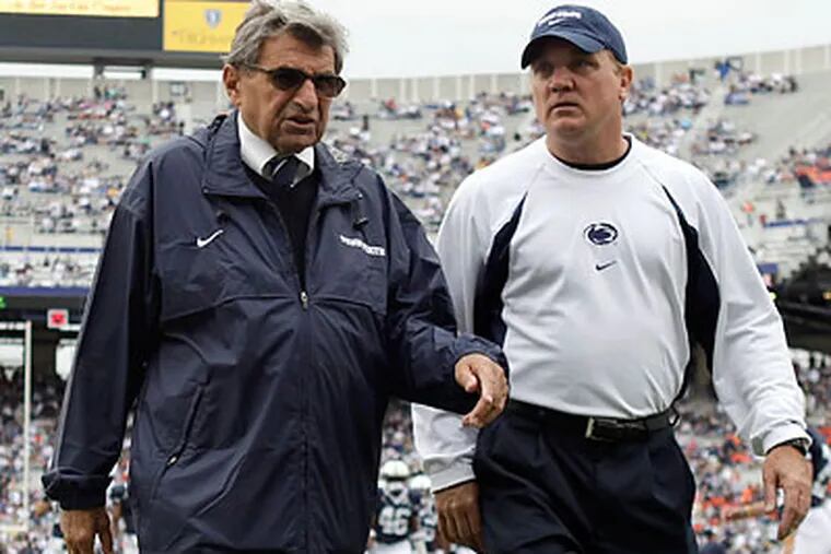 Tom Bradley (right) will serve as Penn State's interim head coach in place of Joe Paterno. (Carolyn Kaster/AP file photo)