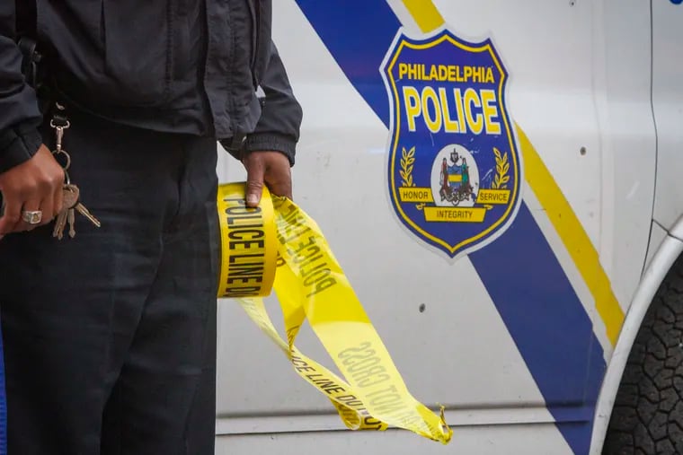 File of crime scene tape. Philadelphia police investigate the shooting death of a young male at 16th and Hunting Park Avenue on Tuesday morning March 28, 2023.
