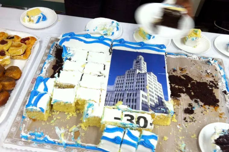A photo-cake, from a newsroom ceremony as the moving day approaches. The -30- was used to mark the end of a type-written news story. TOM GRALISH / Staff Photographer