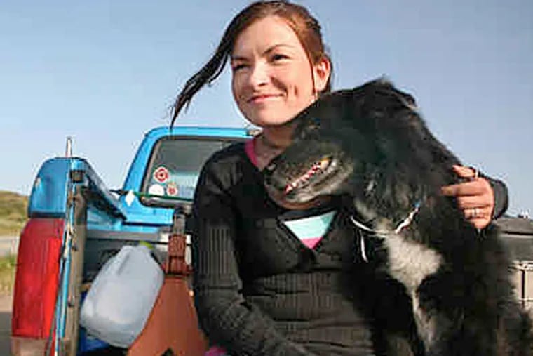 Shay Kelley plans to journey through all 50 states with her dog to help the homeless. (Associated Press)