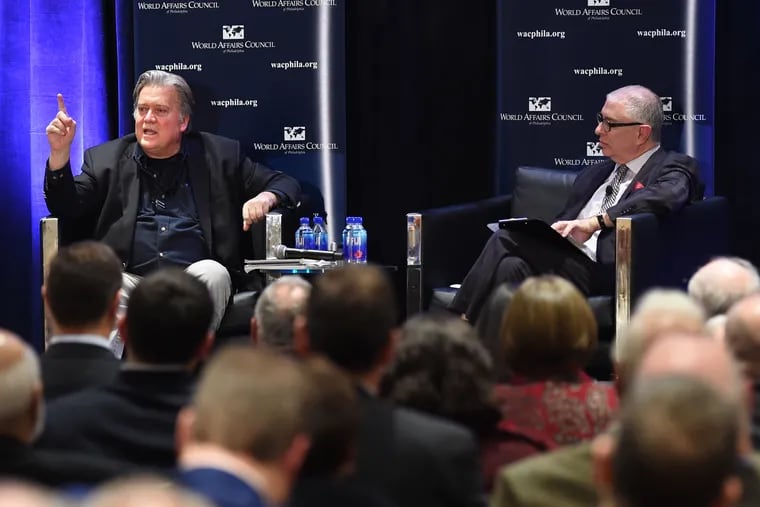 Craig Snyder, right, then-president and CEO of the World Affairs Council of Philadelphia, speaks with Steve Bannon, former White House chief strategist in the Trump administration, in 2019.