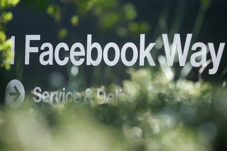 An address sign for Facebook Way is shown in Menlo Park, Calif. in April 2019. Facebook is changing the way it ranks videos and this affects how small businesses use the service. (AP Photo/Jeff Chiu, File)
