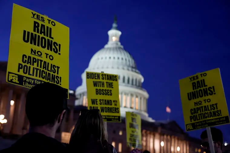 Activists in support of unionized rail workers protesting outside the U.S. Capitol Building on Nov. 29 in Washington. President Joe Biden had called on Congress to pass legislation averting a railroad shutdown ahead of the Dec. 9 coordinated strike date.