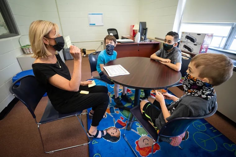 Stephanie Chambers, SEL specialist, works with students at Herma Simmons Elementary, in Clayton, N.J., on Wednesday, May19, 2021. The school has a model program for students with special needs that will be implemented in other schools in three counties.