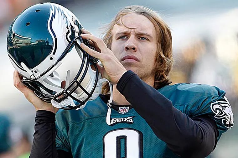 The Eagles have to decide whether Nick Foles is the starter for next season without seeing him in this Sunday's season finale at the Giants. (Yong Kim/Staff Photographer)