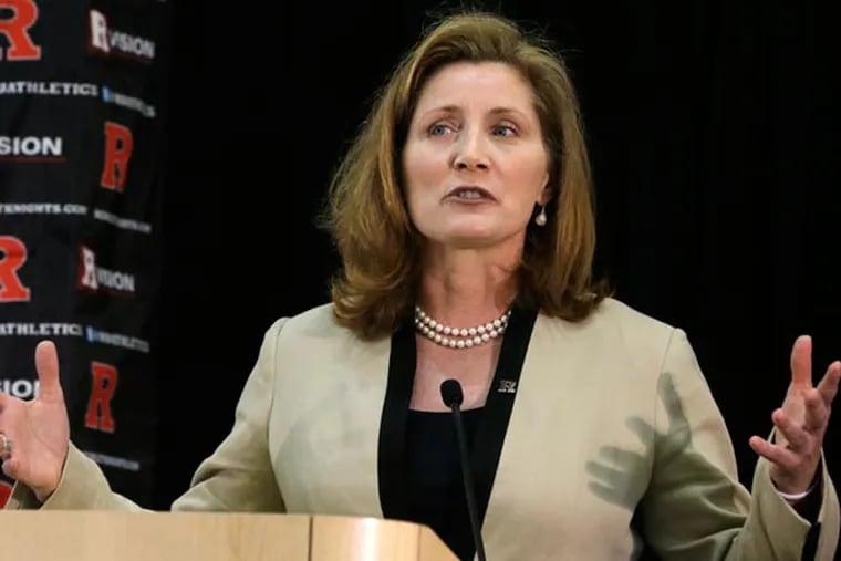 Julie Hermann, hired to clean up Rutgers' scandal-scarred athletic program, quit as Tennessee's women's volleyball coach 16 years ago after her players submitted a letter complaining she ruled through humiliation, fear and emotional abuse. (Mel Evans/AP)