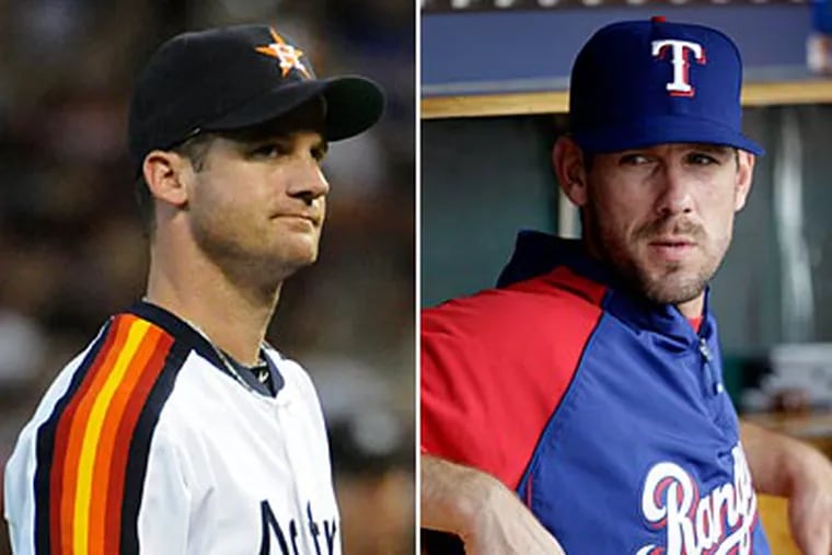 Roy Oswalt (left) was acquired less than a year after the Phillies traded away Cliff Lee. (AP Photos)