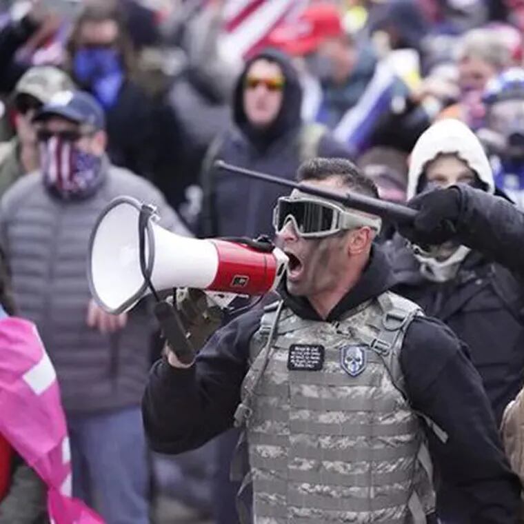 Samuel Lazar, 37, of Ephrata, is pictured shouting to the crowds outside the Capitol on Jan. 6, 2021.