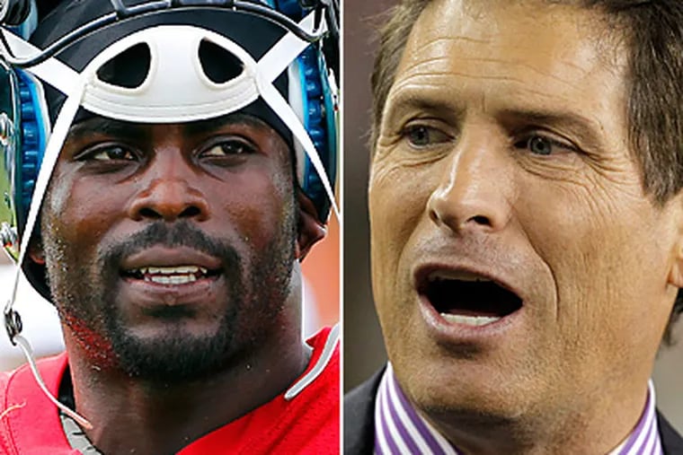 What advice does Hall of Fame quarterback Steve Young have for Michael Vick? (AP Photos)