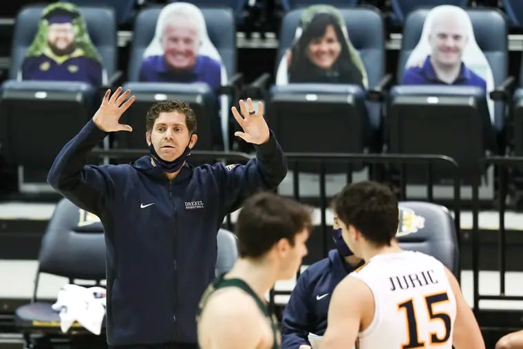 Drexel head coach Zach Spiker instructs from the sidelines in the second half of a game against William & Mary in January.