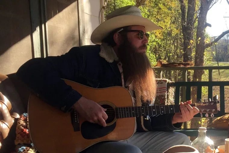 Ben Dickey as Blaze Foley (left) with director Ethan Hawke on the set.