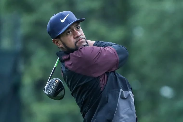 Tony Finau hits his drive on the third hole in the final round of the BMW Championship at Aronimink Golf Club.