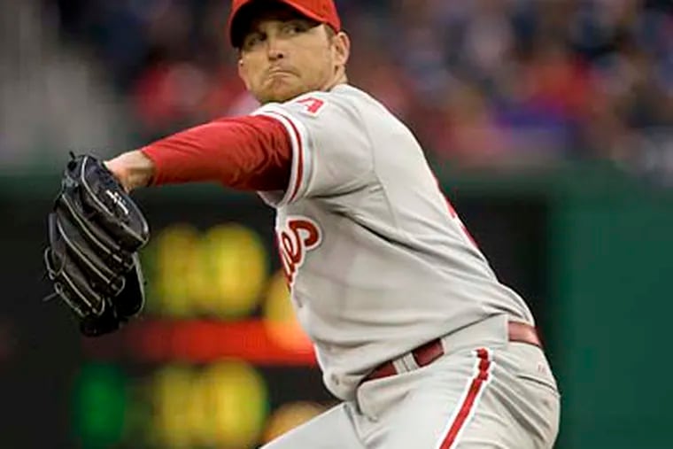 "He's just searching right now for the right way to go about it," Phillies coach Rich Dubee said of Brad Lidge's struggles. (Evan Vucci / AP file photo)